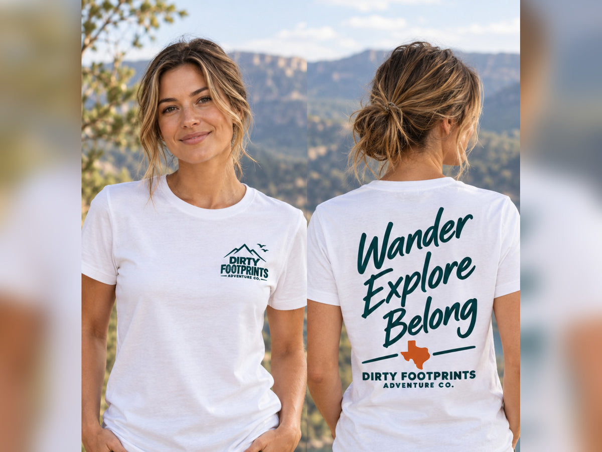 Female model wearing the white Dirty Footprints Wander Explore Belong Texas tee, front and back